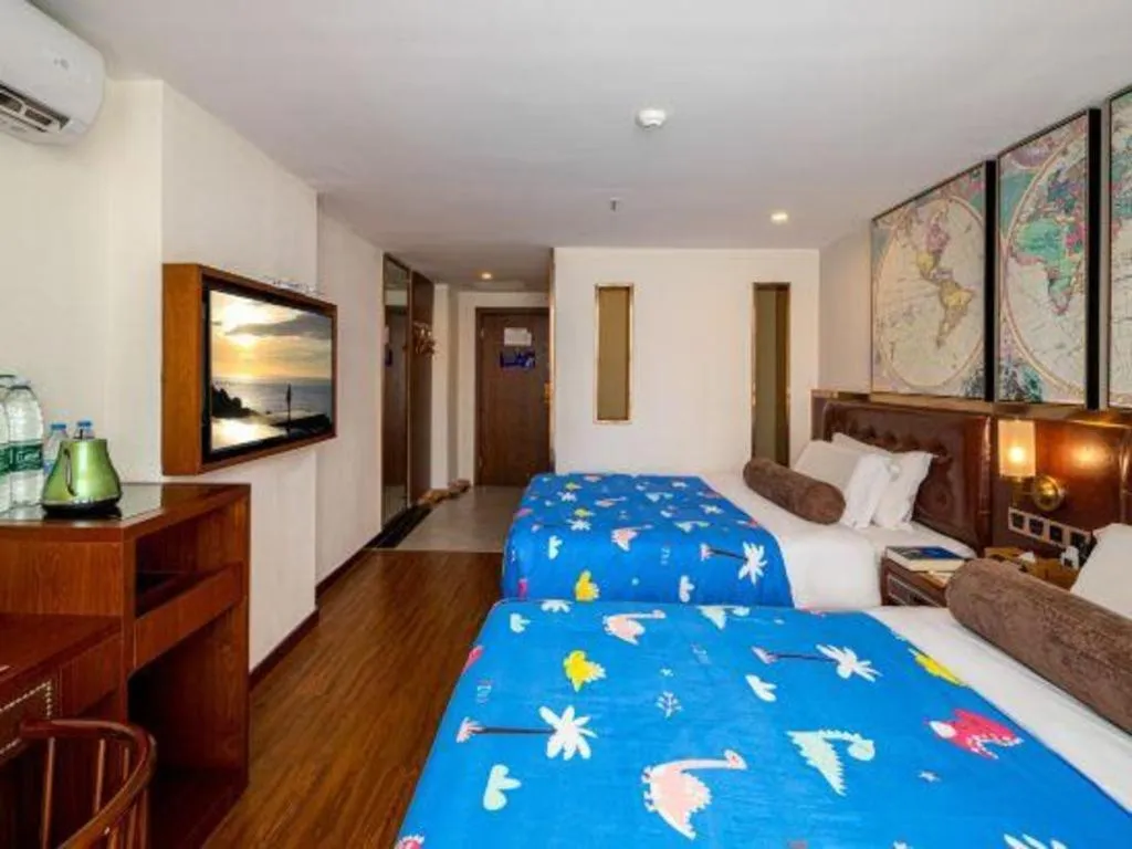 Bed in James Joyce Coffetel Guilin Railway Station Xiangbi Mountain Liangjiang Sihu Wharf