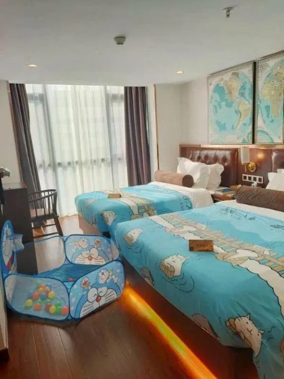 Bed in James Joyce Coffetel Guilin Railway Station Xiangbi Mountain Liangjiang Sihu Wharf