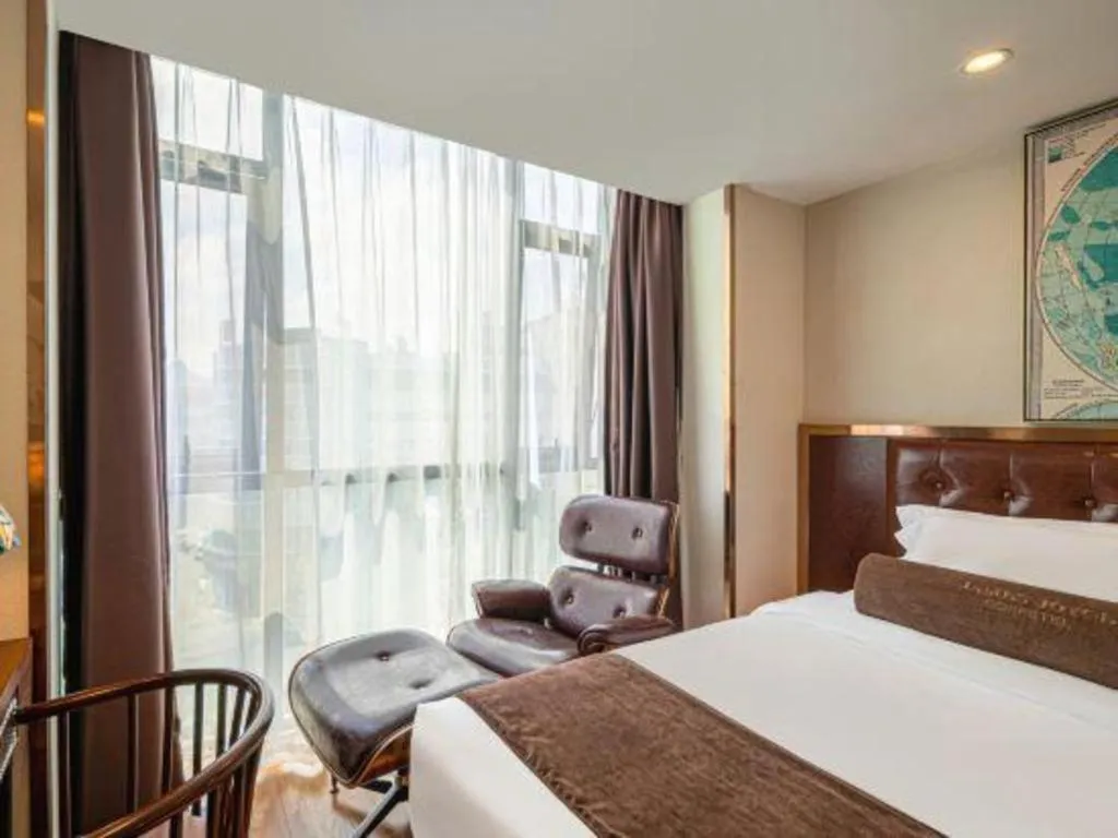 Bed in James Joyce Coffetel Guilin Railway Station Xiangbi Mountain Liangjiang Sihu Wharf