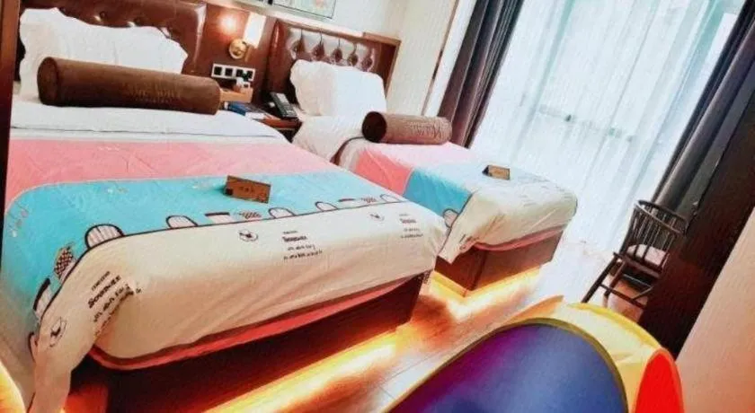 Bed in James Joyce Coffetel Guilin Railway Station Xiangbi Mountain Liangjiang Sihu Wharf