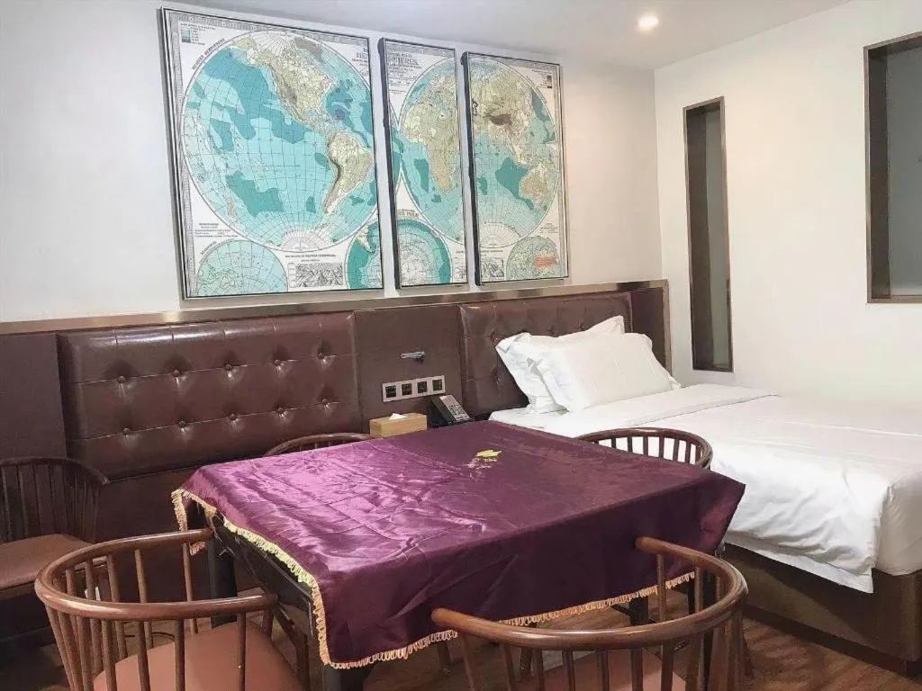 Bed in James Joyce Coffetel Guilin Railway Station Xiangbi Mountain Liangjiang Sihu Wharf