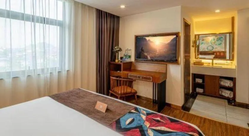 Bed in James Joyce Coffetel Guilin Railway Station Xiangbi Mountain Liangjiang Sihu Wharf