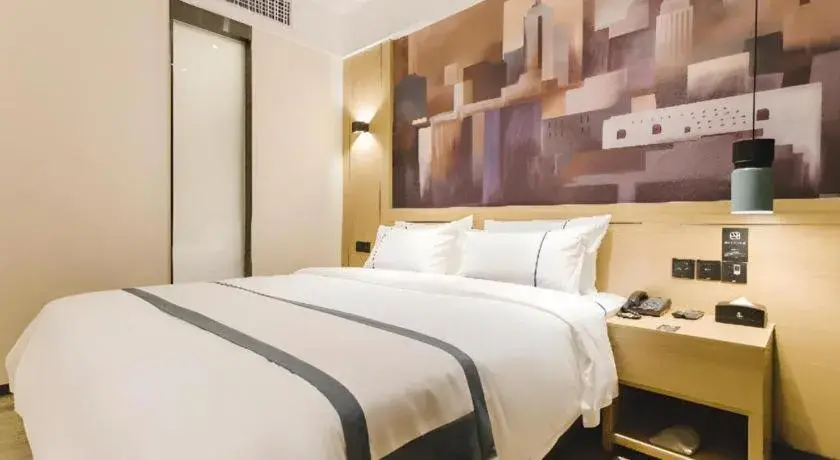 Bed in City Comfort Inn Foshan Sanshui Datang Bed in City Comfort Inn Foshan Sanshui Datang