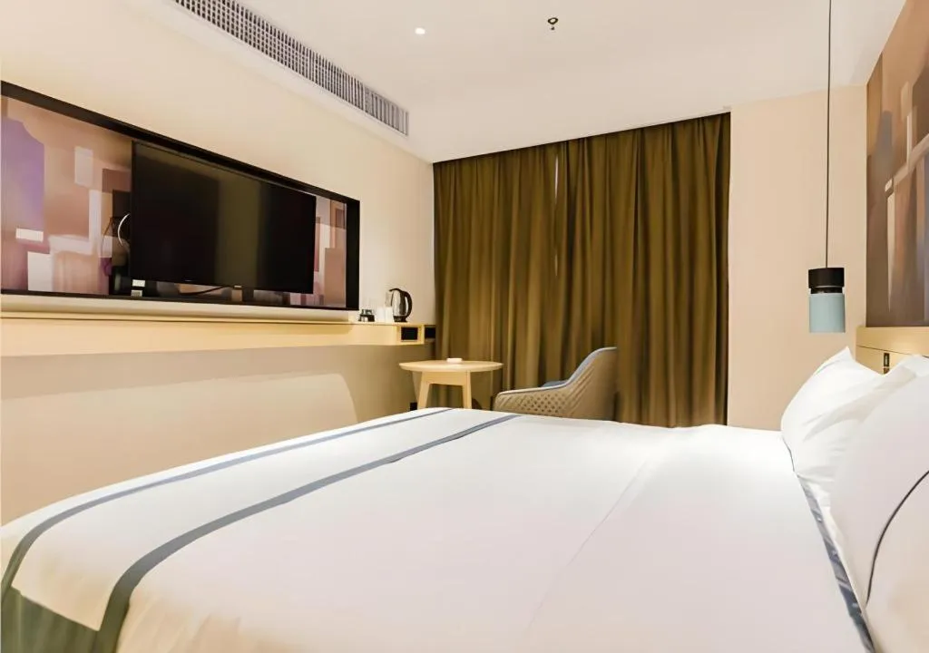 Bed in City Comfort Inn Foshan Sanshui Datang