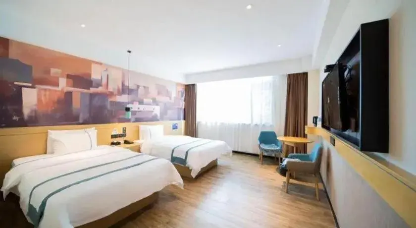 Bed in City Comfort Inn Foshan Sanshui Datang Bed in City Comfort Inn Foshan Sanshui Datang