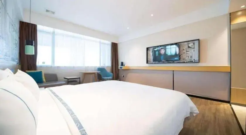 Bed in City Comfort Inn Foshan Sanshui Datang Bed in City Comfort Inn Foshan Sanshui Datang