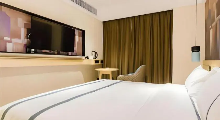 Bed in City Comfort Inn Foshan Sanshui Datang Bed in City Comfort Inn Foshan Sanshui Datang