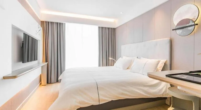 Bed in Magnotel Hotel Huangshan Scenic Area Transfer Center