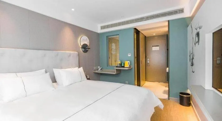 Bed in Magnotel Hotel Huangshan Scenic Area Transfer Center