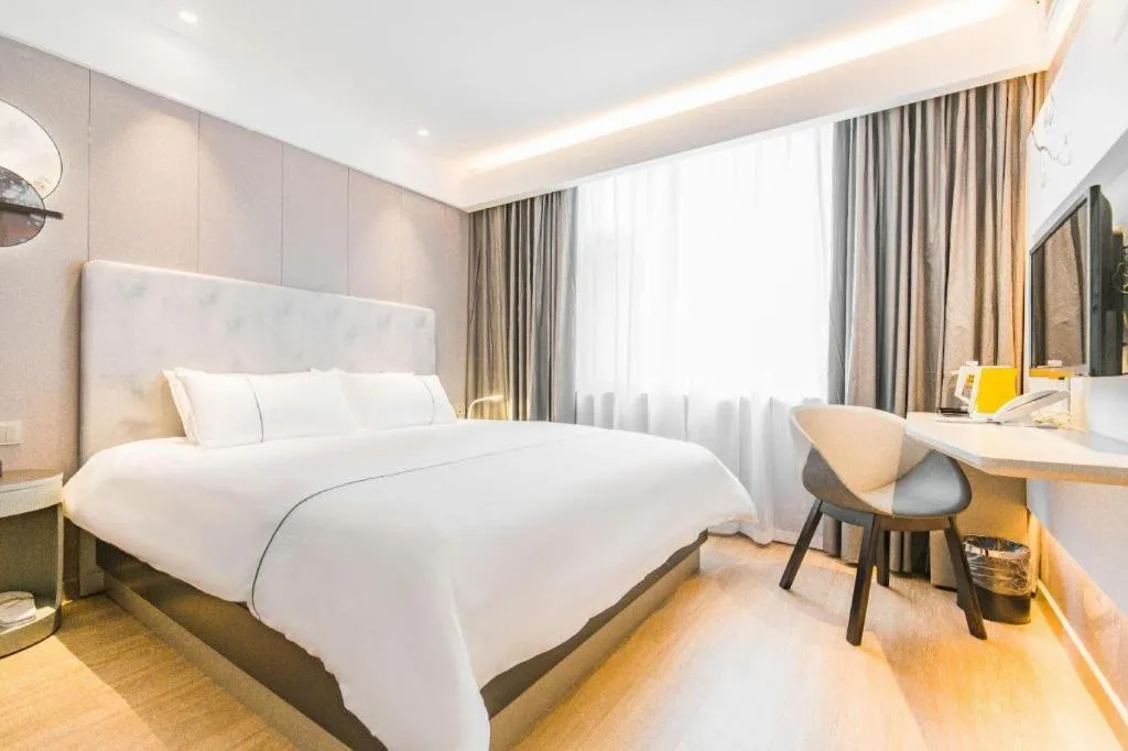 Bed in Magnotel Hotel Huangshan Scenic Area Transfer Center