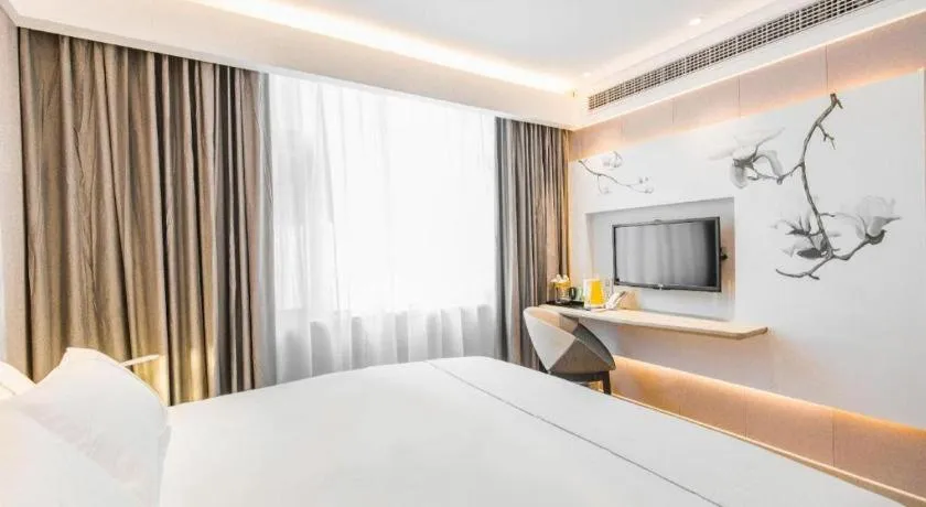 Bed in Magnotel Hotel Huangshan Scenic Area Transfer Center