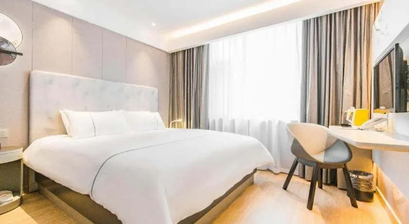 Bed in Magnotel Hotel Huangshan Scenic Area Transfer Center