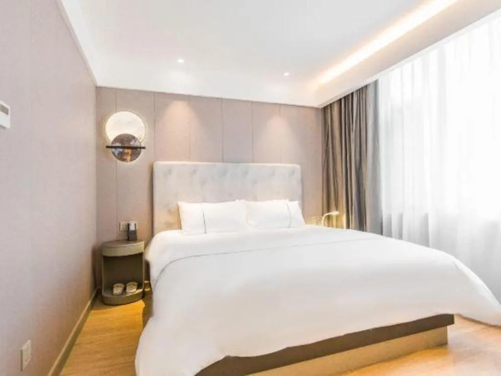 Bed in Magnotel Hotel Huangshan Scenic Area Transfer Center