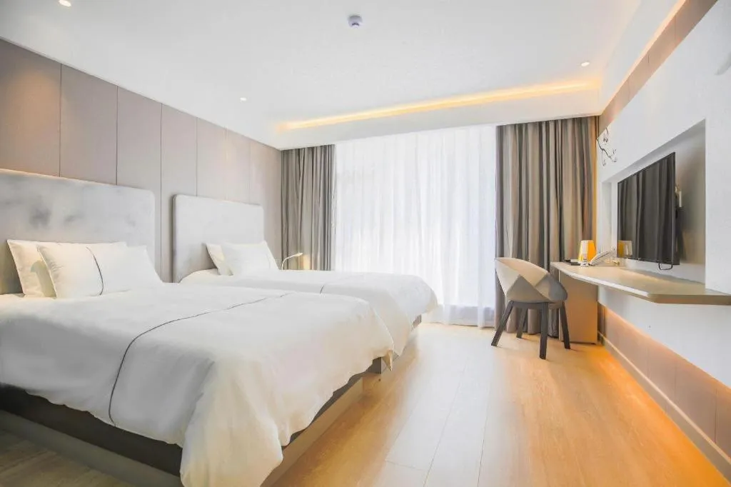 Bed in Magnotel Hotel Huangshan Scenic Area Transfer Center