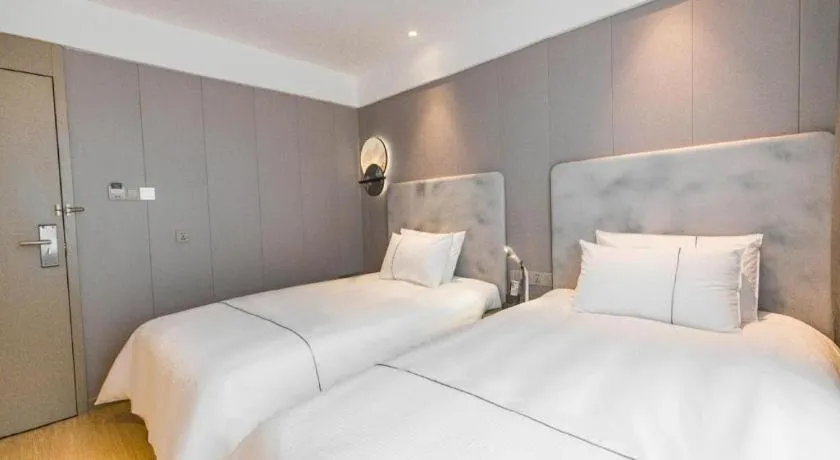 Bed in Magnotel Hotel Huangshan Scenic Area Transfer Center