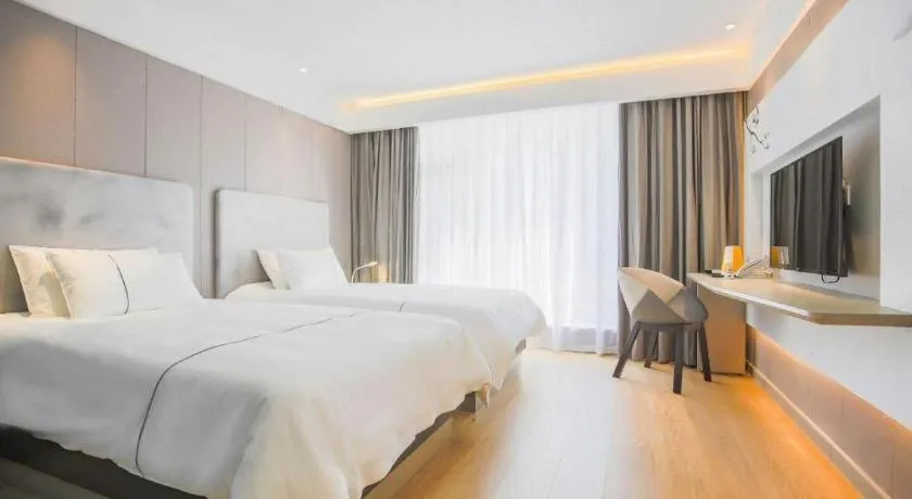 Bed in Magnotel Hotel Huangshan Scenic Area Transfer Center