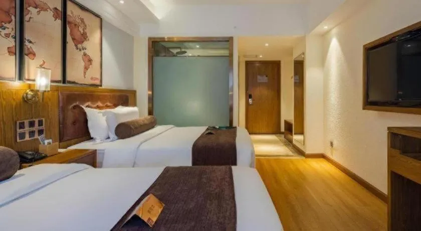 Bed in James Joyce Coffetel Kunming Railway Station Huancheng Nan Road Metro Station