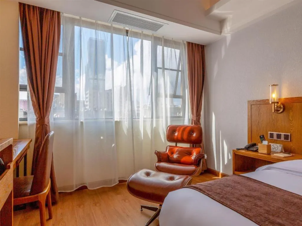 Bed in James Joyce Coffetel Kunming Railway Station Huancheng Nan Road Metro Station