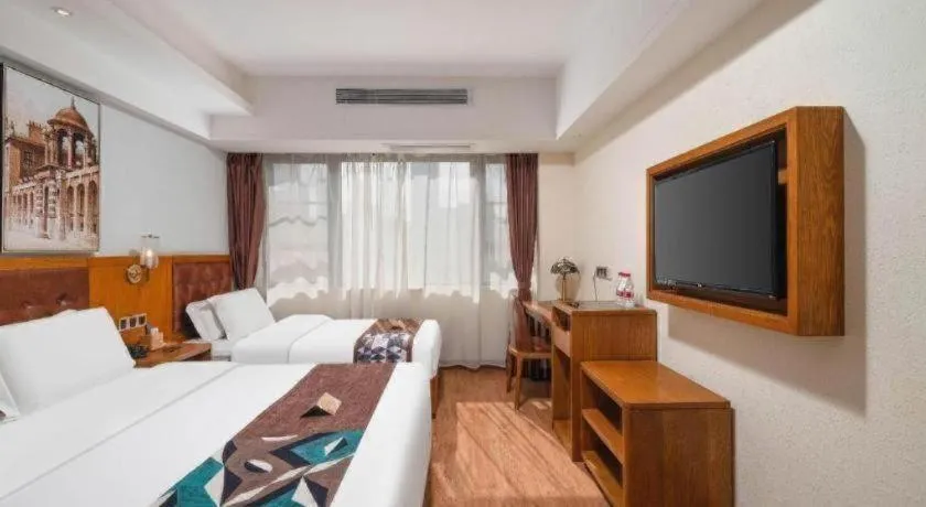 Bed in James Joyce Coffetel Kunming Railway Station Huancheng Nan Road Metro Station