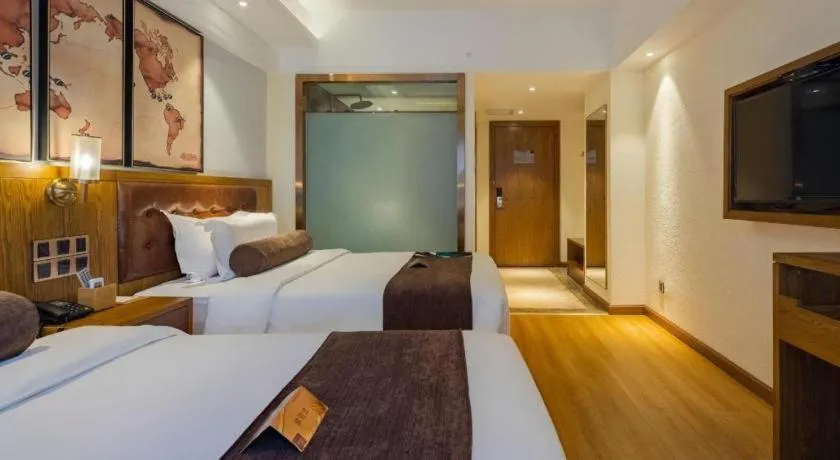 Bed in James Joyce Coffetel Kunming Railway Station Huancheng Nan Road Metro Station