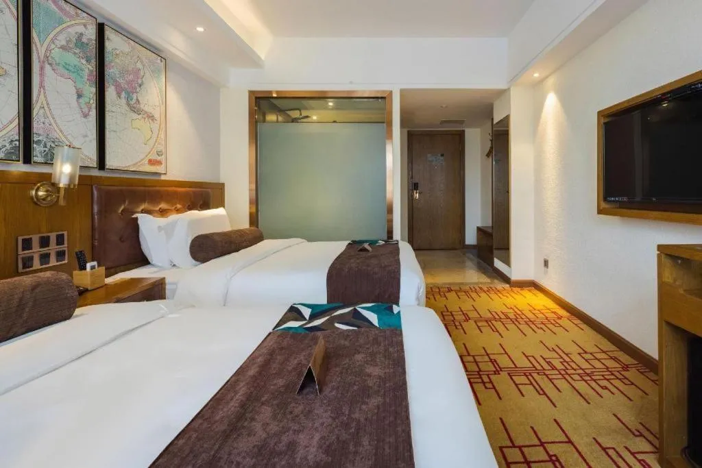 Bed in James Joyce Coffetel Kunming Railway Station Huancheng Nan Road Metro Station