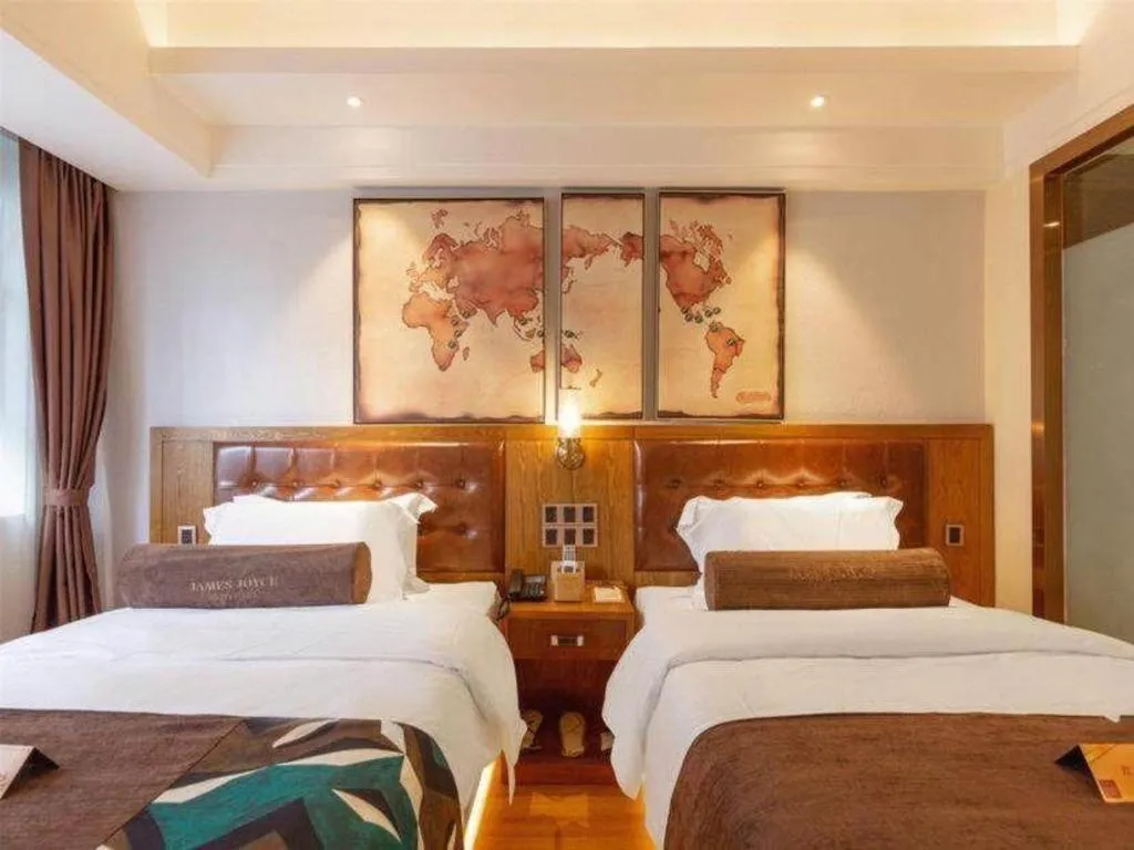 Bed in James Joyce Coffetel Kunming Railway Station Huancheng Nan Road Metro Station