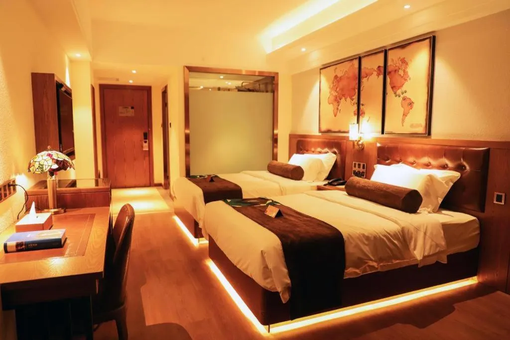 Bed in James Joyce Coffetel Kunming Railway Station Huancheng Nan Road Metro Station