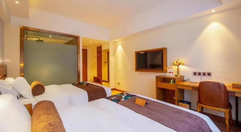 Bed in James Joyce Coffetel Kunming Railway Station Huancheng Nan Road Metro Station