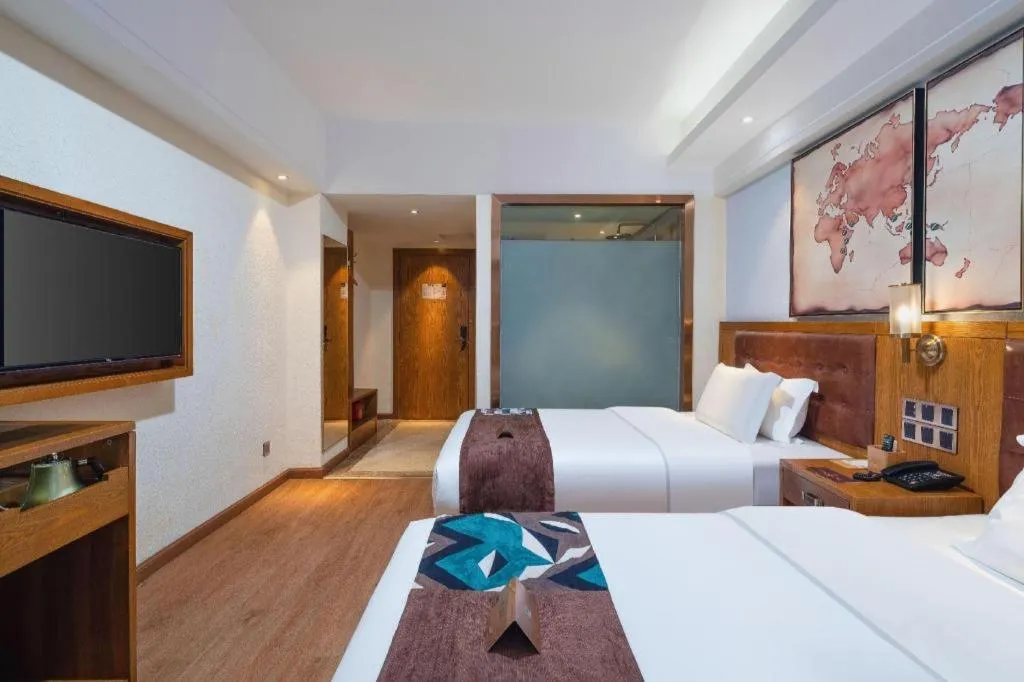 Bed in James Joyce Coffetel Kunming Railway Station Huancheng Nan Road Metro Station