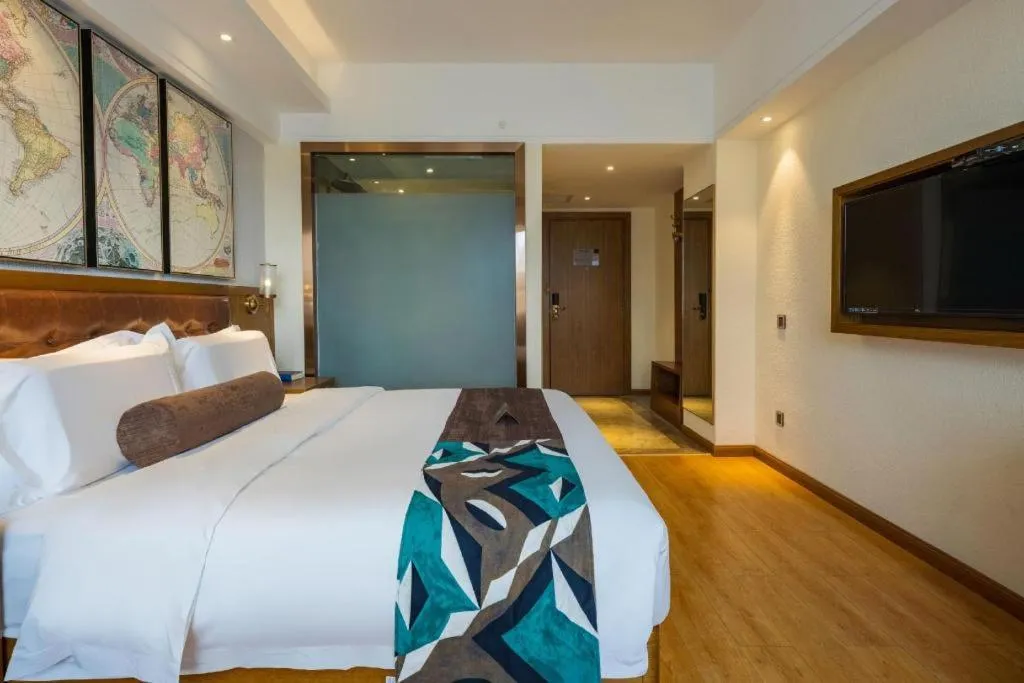 Bed in James Joyce Coffetel Kunming Railway Station Huancheng Nan Road Metro Station