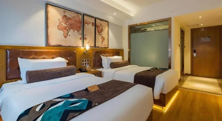 Bed in James Joyce Coffetel Kunming Railway Station Huancheng Nan Road Metro Station