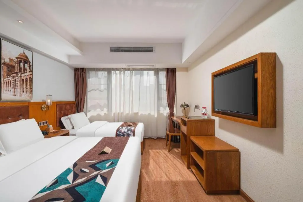 Bed in James Joyce Coffetel Kunming Railway Station Huancheng Nan Road Metro Station