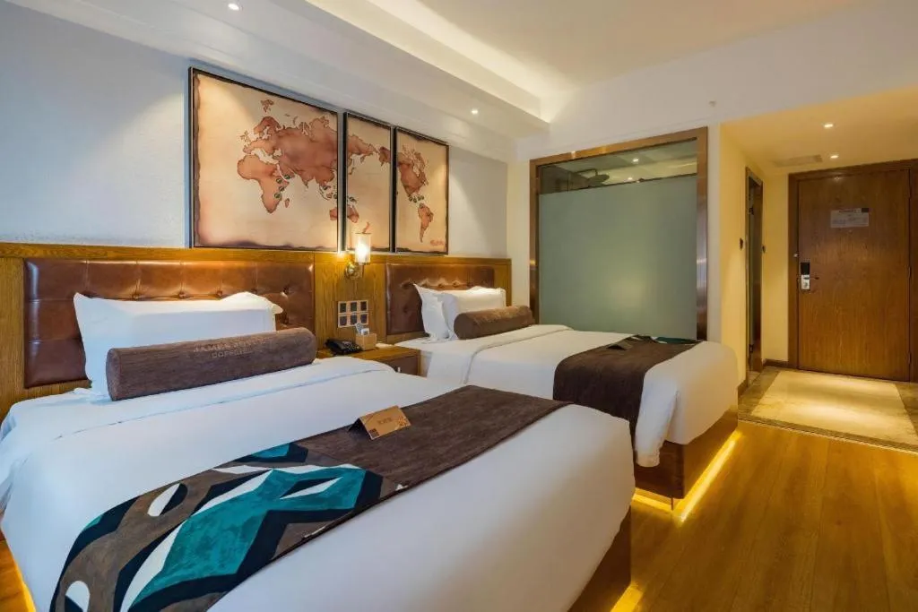 Bed in James Joyce Coffetel Kunming Railway Station Huancheng Nan Road Metro Station