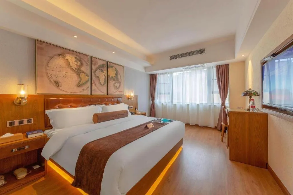 Bed in James Joyce Coffetel Kunming Railway Station Huancheng Nan Road Metro Station