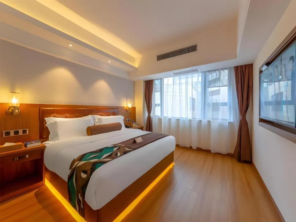 Bed in James Joyce Coffetel Kunming Railway Station Huancheng Nan Road Metro Station