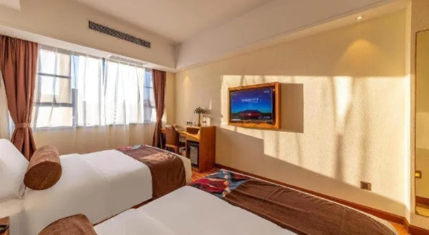 Bed in James Joyce Coffetel Kunming Railway Station Huancheng Nan Road Metro Station