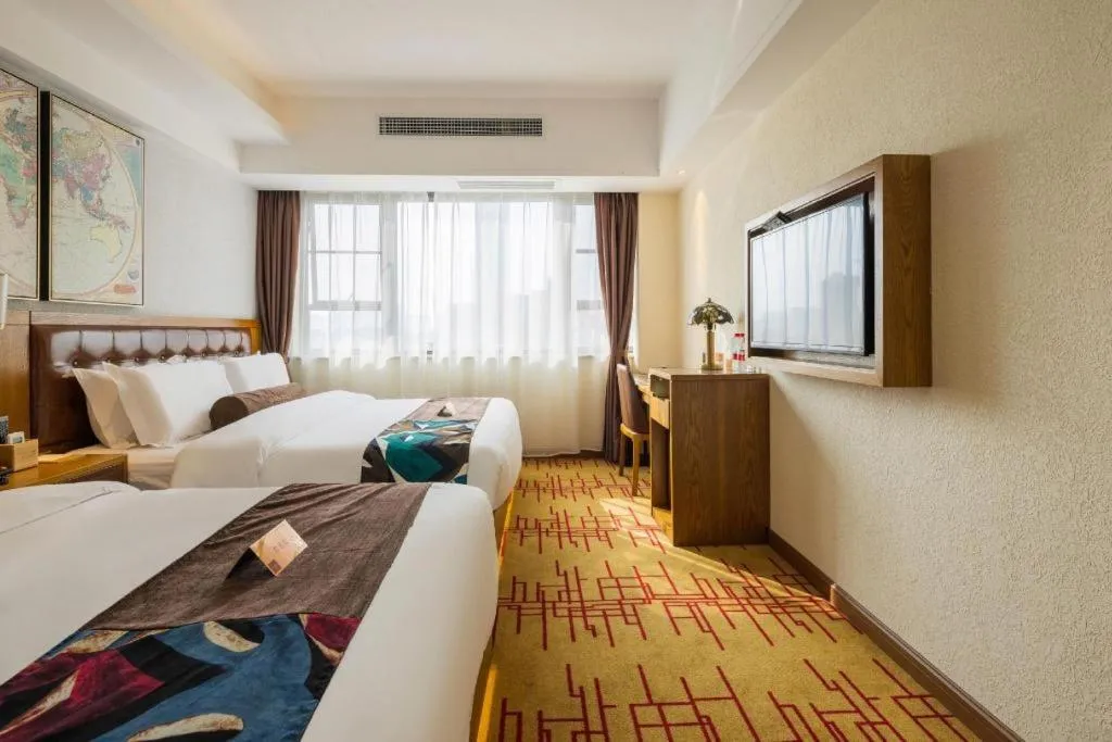 Bed in James Joyce Coffetel Kunming Railway Station Huancheng Nan Road Metro Station