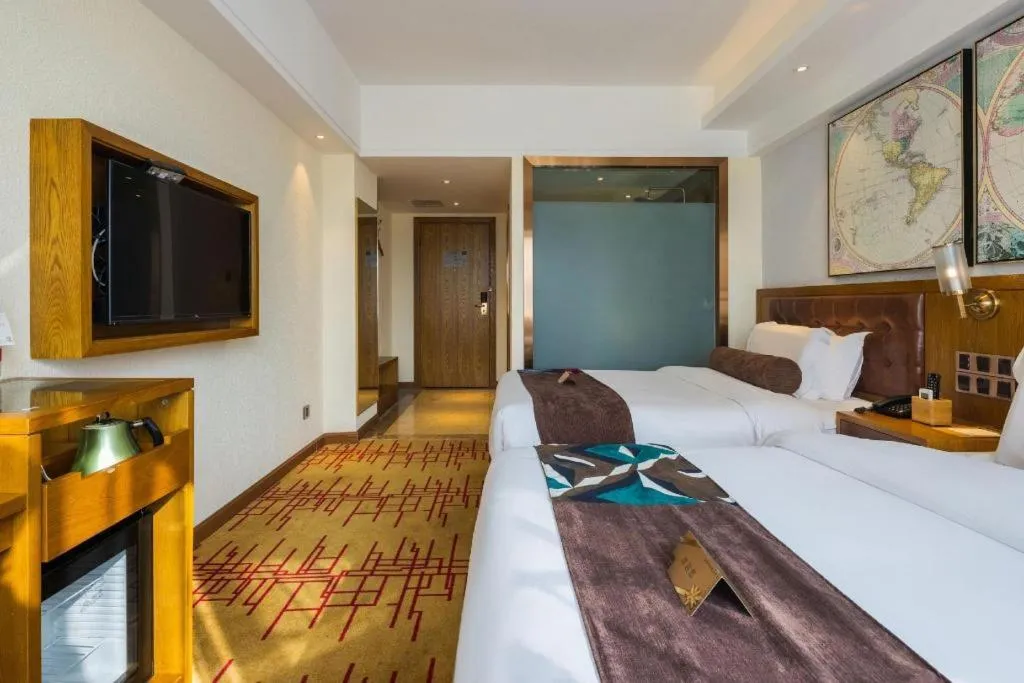 Bed in James Joyce Coffetel Kunming Railway Station Huancheng Nan Road Metro Station