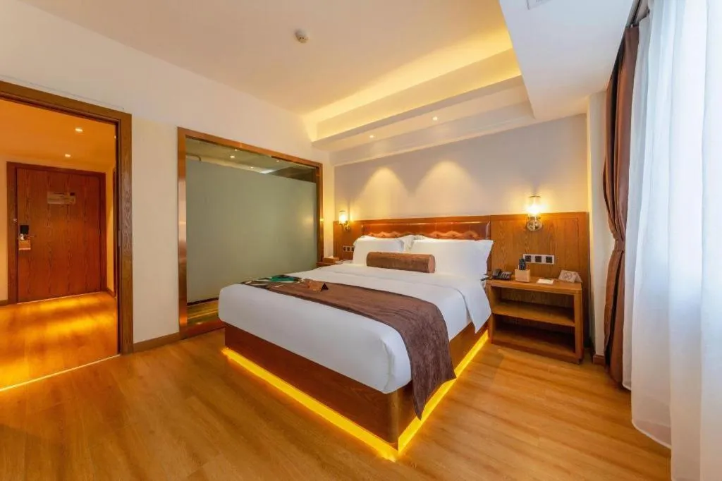 Bed in James Joyce Coffetel Kunming Railway Station Huancheng Nan Road Metro Station