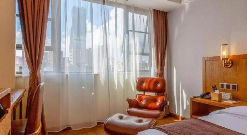 Bed in James Joyce Coffetel Kunming Railway Station Huancheng Nan Road Metro Station