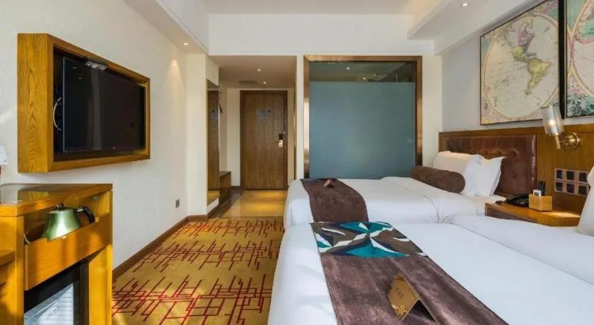 Bed in James Joyce Coffetel Kunming Railway Station Huancheng Nan Road Metro Station