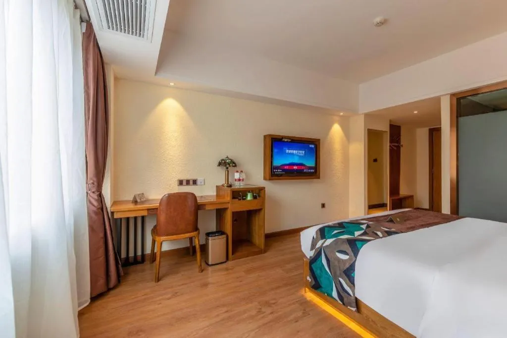 Bed in James Joyce Coffetel Kunming Railway Station Huancheng Nan Road Metro Station