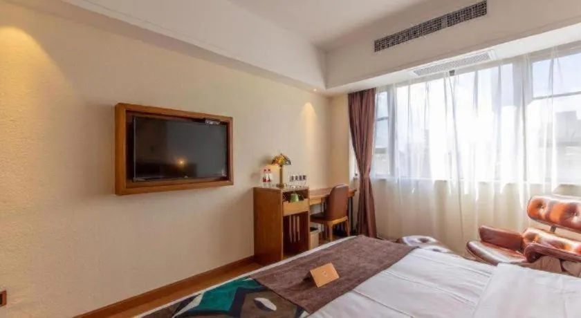 Bed in James Joyce Coffetel Kunming Railway Station Huancheng Nan Road Metro Station