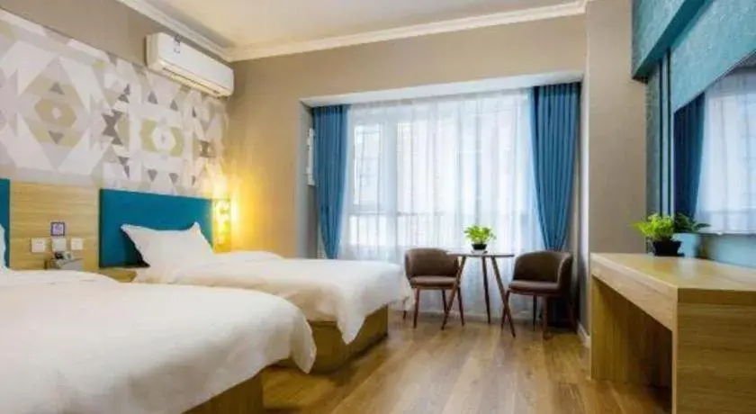 Bed in PAI Hotel Xi'an Kunming Road Hancheng South Road Metro Station Bed in PAI Hotel Xi'an Kunming Road Hancheng South Road Metro Station