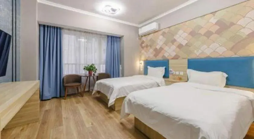 Bed in PAI Hotel Xi'an Kunming Road Hancheng South Road Metro Station Bed in PAI Hotel Xi'an Kunming Road Hancheng South Road Metro Station