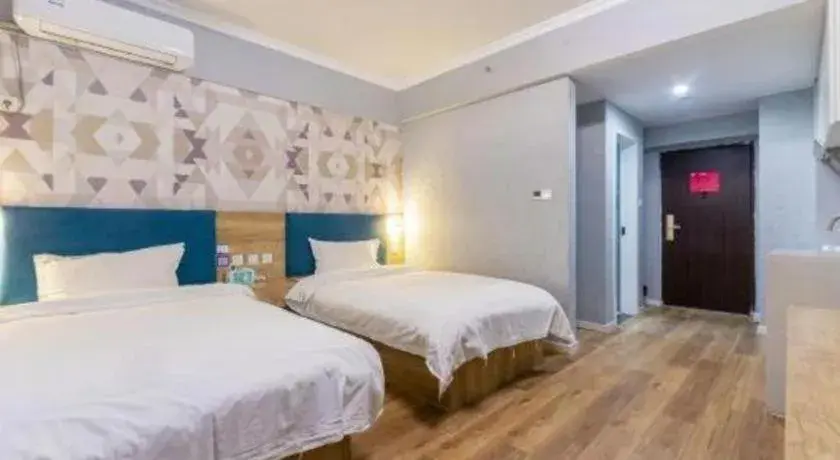 Bed in PAI Hotel Xi'an Kunming Road Hancheng South Road Metro Station Bed in PAI Hotel Xi'an Kunming Road Hancheng South Road Metro Station