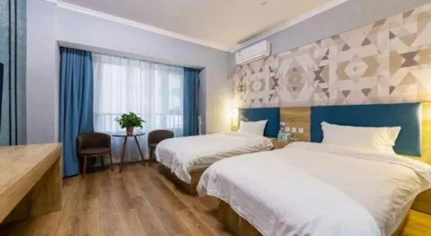 Bed in PAI Hotel Xi'an Kunming Road Hancheng South Road Metro Station Bed in PAI Hotel Xi'an Kunming Road Hancheng South Road Metro Station