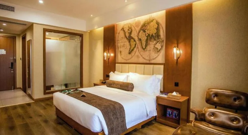 Bed in James Joyce Coffetel Xinyang Municipal Government Railway Station