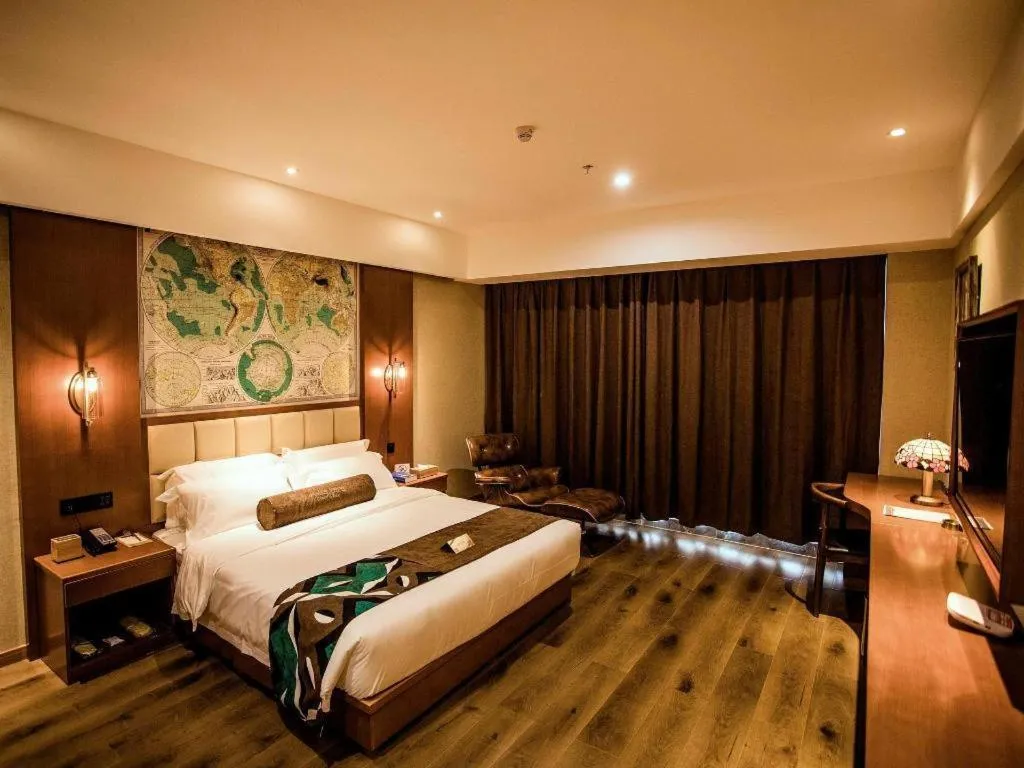 Bed in James Joyce Coffetel Xinyang Municipal Government Railway Station