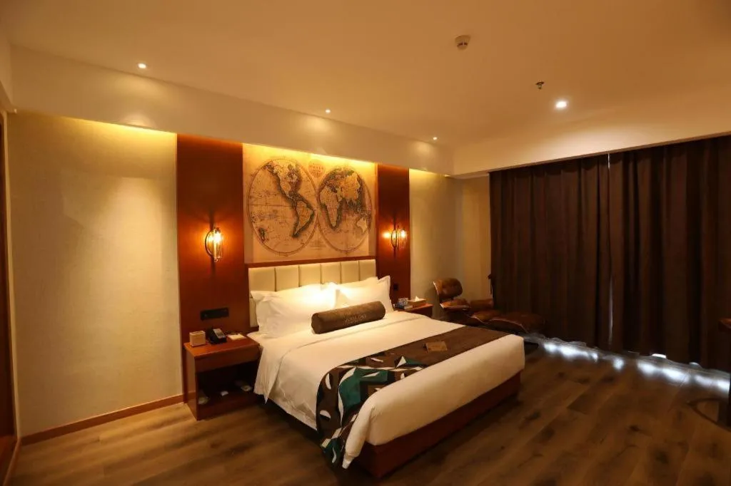 Bed in James Joyce Coffetel Xinyang Municipal Government Railway Station